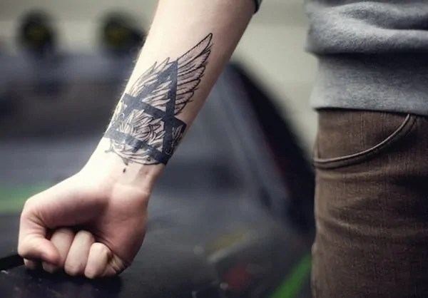 Justin Bieber Finally Reveals Mysterious Arm TattooAnd its an Angels  Wing PopStarTats