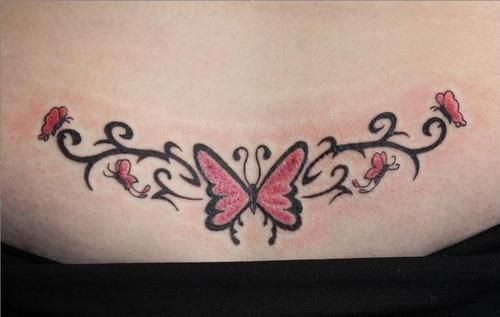 pink butterfly tattoo for lower back