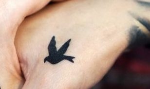 bird and cage couple tattoo