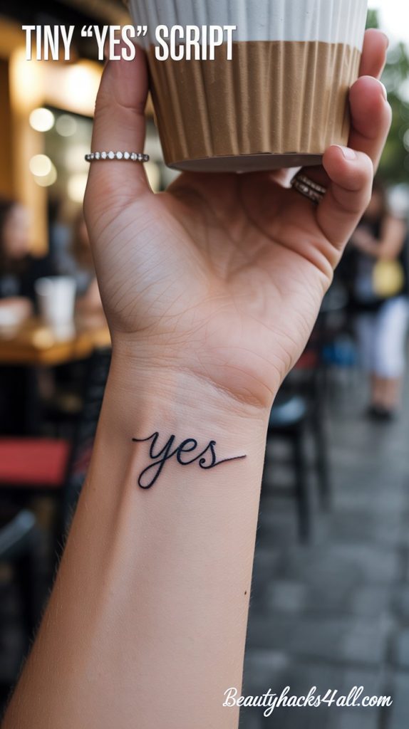 tiny-yes-script-tattoo
